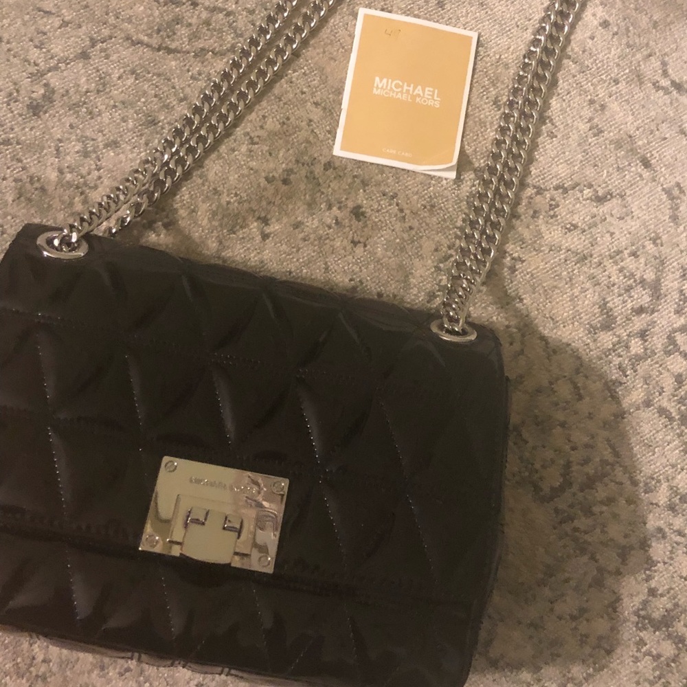 Michael Kors shoulder/crossbody handbag.